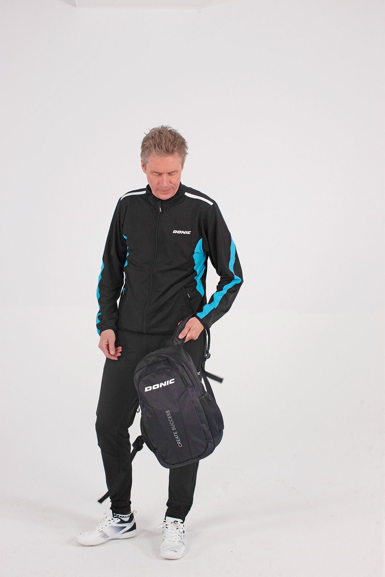 Chaqueta de chándal Donic Averis negro/azul claro/blanco